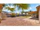 This backyard has desert landscaping, a covered patio, and is ready for your personal touches at 1633 W Andorra Dr, Phoenix, AZ 85029