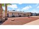 Charming single-story home featuring a well-kept landscape with a palm tree in a desert environment, perfect for serene living at 1633 W Andorra Dr, Phoenix, AZ 85029