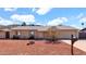 Inviting single-level home with a two-car garage and desert-style landscaping, offering a blend of comfort and easy maintenance at 1633 W Andorra Dr, Phoenix, AZ 85029