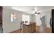 Bright kitchen island with extra storage in a well-lit, tiled floor area at 1633 W Andorra Dr, Phoenix, AZ 85029