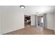 Open living area with sliding glass doors to the outside and tiled flooring at 1633 W Andorra Dr, Phoenix, AZ 85029
