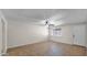Open-concept living room featuring tiled floors, fresh paint, and ample natural light provides a versatile and welcoming atmosphere at 1633 W Andorra Dr, Phoenix, AZ 85029