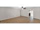 Unfurnished living room with tile floors and neutral paint, perfect for customization and modern living at 1633 W Andorra Dr, Phoenix, AZ 85029