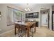 Cozy dining area with a table, a bar, and wine storage at 1785 S Morrison Ln, Gilbert, AZ 85295