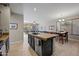 Kitchen featuring granite countertops and a view into the Gathering room at 1785 S Morrison Ln, Gilbert, AZ 85295