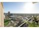 Breathtaking city view from a high-rise balcony with potted plants at 2323 N Central Ave # Ph-C, Phoenix, AZ 85004