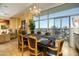 Elegant dining room with large windows, chandelier, and views of the city at 2323 N Central Ave # Ph-C, Phoenix, AZ 85004