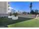 Dog run with artificial grass and a dog waste station at 2323 N Central Ave # Ph-C, Phoenix, AZ 85004