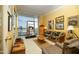 Comfortable living room with floor-to-ceiling windows that provide stunning views of the city skyline at 2323 N Central Ave # Ph-C, Phoenix, AZ 85004
