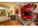 Stylish living room features leopard print seating and vibrant red shelves at 2323 N Central Ave # Ph-C, Phoenix, AZ 85004