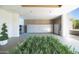 Modern lobby area with secure package lockers and attractive landscaping at 2323 N Central Ave # Ph-C, Phoenix, AZ 85004
