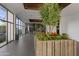 Lobby with planters and greenery along a bright corridor at 2323 N Central Ave # Ph-C, Phoenix, AZ 85004