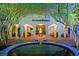 Elegant museum entrance with serene water feature and lush greenery at 2323 N Central Ave # Ph-C, Phoenix, AZ 85004
