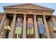 Exterior of Monroe School, featuring historic architecture and banners at 2323 N Central Ave # Ph-C, Phoenix, AZ 85004