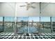 Cozy sitting area boasting a cityscape backdrop through large full-length window panels at 2323 N Central Ave # Ph-C, Phoenix, AZ 85004