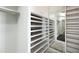 Organized walk-in closet features custom shelving units for efficient storage and organization of clothing and accessories at 2323 N Central Ave # Ph-C, Phoenix, AZ 85004