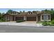A charming attached villa featuring a private two-car garage and well-kept landscaping at 24973 N 174Th Ave, Surprise, AZ 85387