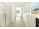 Bathroom showcasing a walk-in shower, soaking tub, and dual-sink vanity at 2639 E Santa Ynez Dr, Casa Grande, AZ 85194