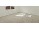 Bright bedroom with soft carpeting and sunlit window at 2639 E Santa Ynez Dr, Casa Grande, AZ 85194