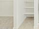 Walk-in closet with carpet flooring and built-in shelves at 2639 E Santa Ynez Dr, Casa Grande, AZ 85194