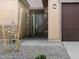 The front door boasts stone pillars, manicured stone landscaping, and a covered porch at 2639 E Santa Ynez Dr, Casa Grande, AZ 85194