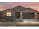 Charming single-story home featuring a well-maintained yard, two-car garage, and neutral color palette at 2639 E Santa Ynez Dr, Casa Grande, AZ 85194
