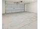 Spacious two-car garage with a clean, sealed concrete floor and an automatic garage door at 2639 E Santa Ynez Dr, Casa Grande, AZ 85194