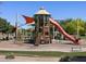 Community playground with climbing and sliding features at 2639 E Santa Ynez Dr, Casa Grande, AZ 85194
