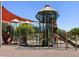 Large, shaded playground featuring multiple slides, climbing structures and shade sails at 2639 E Santa Ynez Dr, Casa Grande, AZ 85194