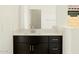 Bathroom vanity with a white countertop and dark wood cabinets at 2639 E Santa Ynez Dr, Casa Grande, AZ 85194