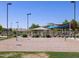 Community volleyball court with sand and shade structures nearby at 2639 E Santa Ynez Dr, Casa Grande, AZ 85194