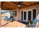 Covered patio has tile floors and ceiling fans with an outdoor seating area at 2810 S Emerson --, Mesa, AZ 85210