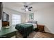 Bedroom featuring a ceiling fan, wood flooring, and natural light at 2810 S Emerson --, Mesa, AZ 85210