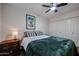 Bedroom featuring a ceiling fan, closet doors, and natural light at 2810 S Emerson --, Mesa, AZ 85210