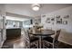 Cozy dining area with a round table adjacent to the updated kitchen and open to the living room at 2810 S Emerson --, Mesa, AZ 85210