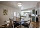 Charming dining nook featuring a round wooden table, and chairs next to the patio door at 2810 S Emerson --, Mesa, AZ 85210