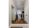 Bright entryway hallway with wood flooring, leading to the living room and kitchen at 2810 S Emerson --, Mesa, AZ 85210