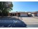 Charming single-story brick home with a two-car garage, desert landscaping, and a well-manicured lawn at 2810 S Emerson --, Mesa, AZ 85210