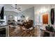 Open concept living room with hardwood floors, comfortable seating, and ample natural light at 2810 S Emerson --, Mesa, AZ 85210