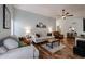 Spacious living room showcasing hardwood floors, neutral decor, and comfortable furnishings at 2810 S Emerson --, Mesa, AZ 85210
