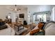 Bright living room with a ceiling fan, a view of the kitchen, and plenty of space to relax and unwind at 2810 S Emerson --, Mesa, AZ 85210