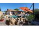 This in-ground pool features a rock waterfall and lounge area; a backyard oasis at 2810 S Emerson --, Mesa, AZ 85210