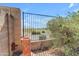 The backyard fence showcases views of native desert vegetation at 29081 N Cactus Cir, San Tan Valley, AZ 85143