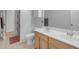 Bright bathroom featuring a double sink vanity and neutral decor at 29081 N Cactus Cir, San Tan Valley, AZ 85143