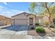 Charming single-story home featuring a two-car garage and desert landscaping at 29081 N Cactus Cir, San Tan Valley, AZ 85143