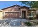 Charming single-story home with a two-car garage and desert landscaping at 29081 N Cactus Cir, San Tan Valley, AZ 85143