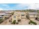 Aerial view of a two-story home in a vibrant neighborhood with desert landscaping and community amenities at 2926 W Thorn Tree Dr, Phoenix, AZ 85085
