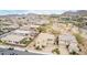 Aerial view of backyard showcasing pool, patio with seating, and artificial turf, perfect for relaxing or entertaining at 2926 W Thorn Tree Dr, Phoenix, AZ 85085