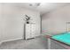 Bright bedroom with neutral colors, plush carpet, and decorative dresser at 2926 W Thorn Tree Dr, Phoenix, AZ 85085