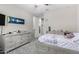 Spacious bedroom features plush carpet, a ceiling fan, and large closet at 2926 W Thorn Tree Dr, Phoenix, AZ 85085
